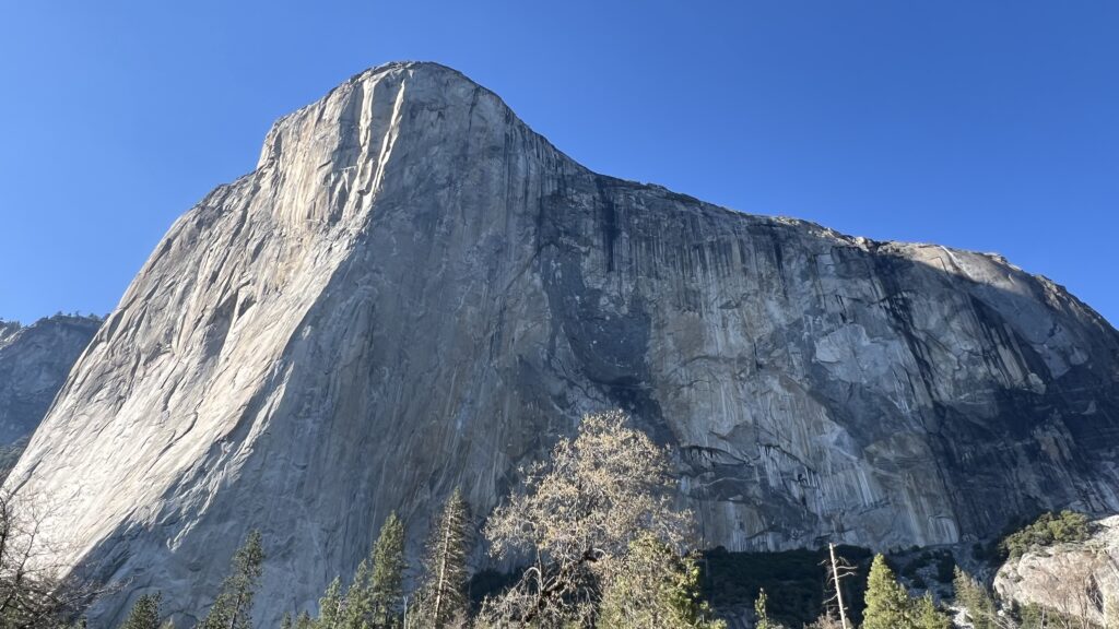A photo of El Capitan demonstrating how tiny climbers appear on the massive granite wall
