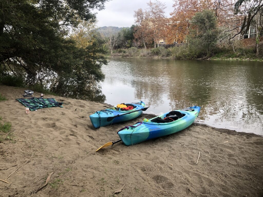 Picture of two kayaks on a beach along the Napa River.